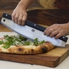 Kołyskowy nóż do pizzy